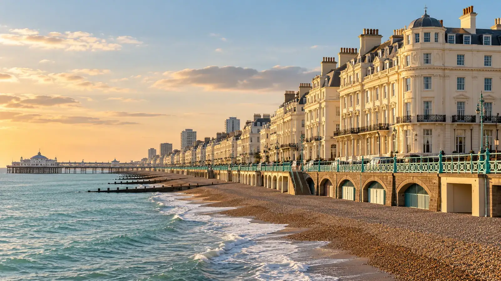 Brighton seafront and Regency buildings beside the sea in warm coastal light